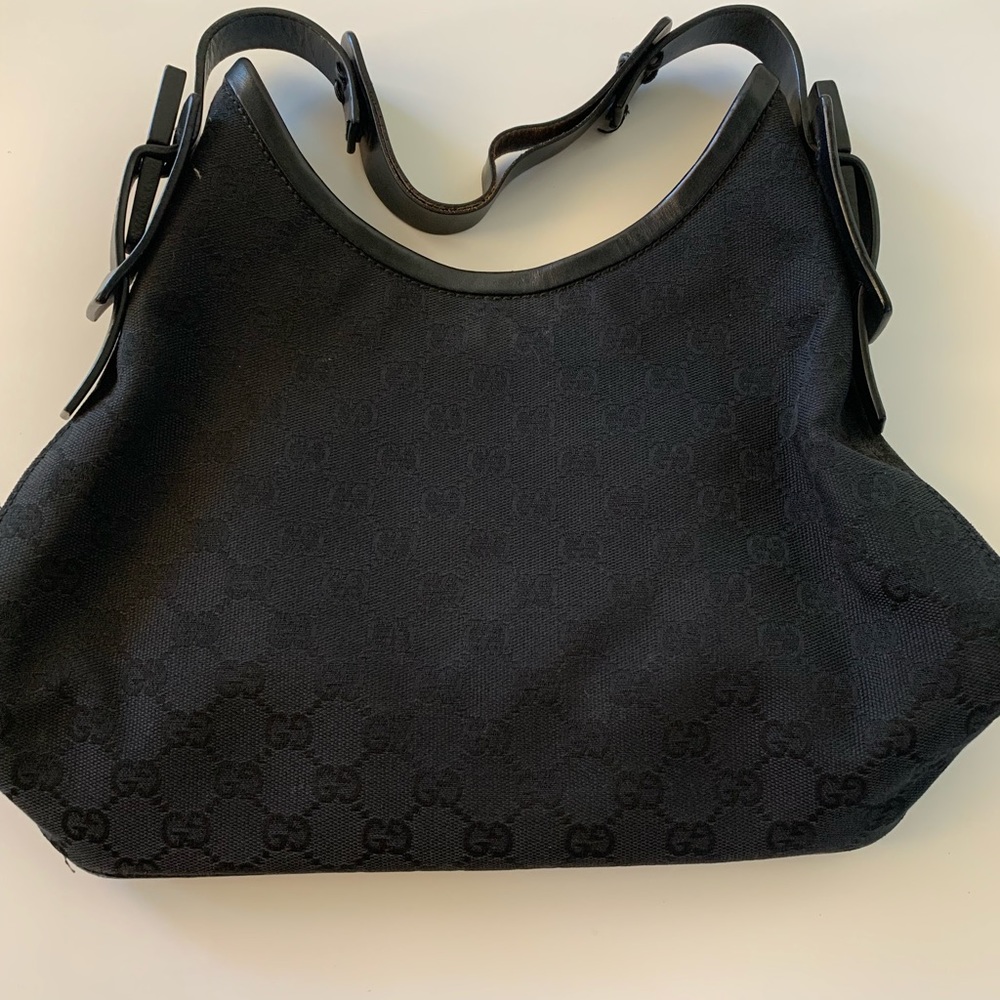 Black Gucci handbag